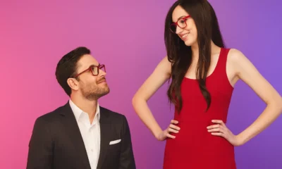 Man and woman talking about the tallest pornstars